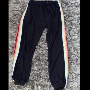 Black sweatpants with color stripes on the side